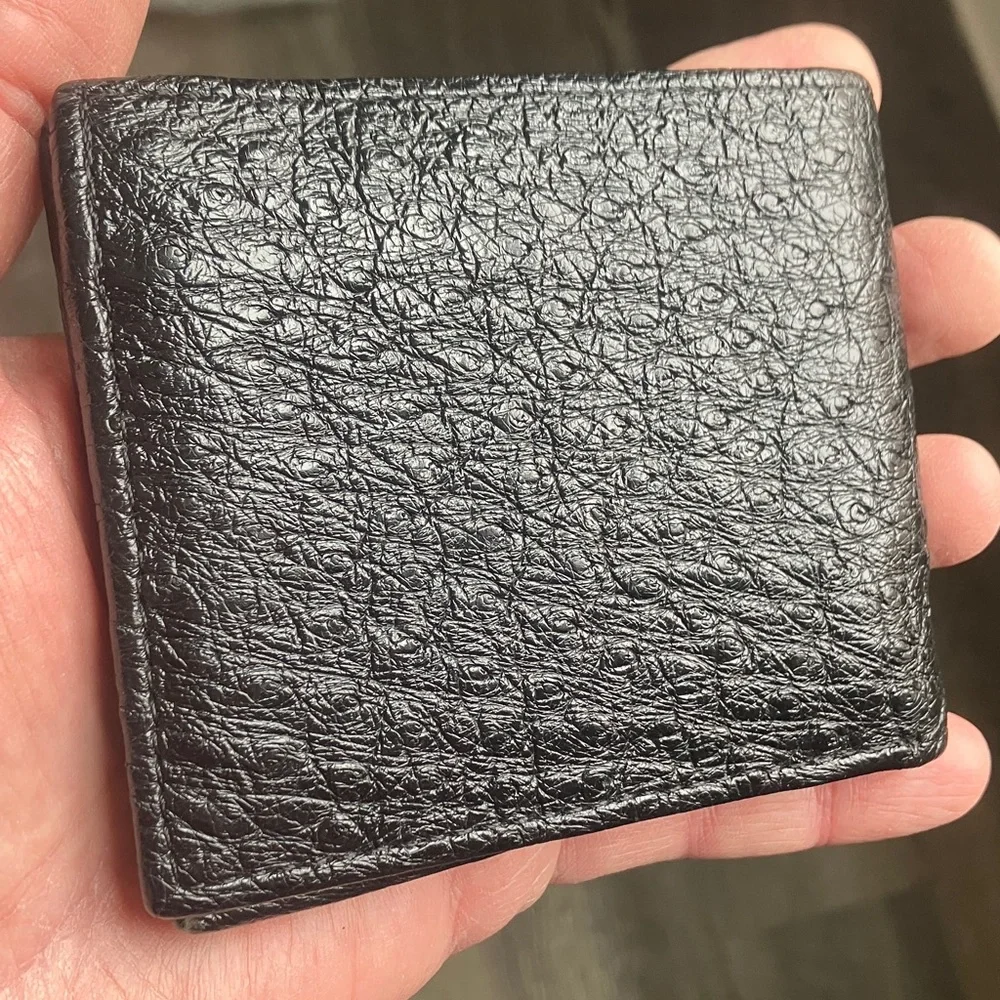black bifold wallet made from genuine ostrich leather.